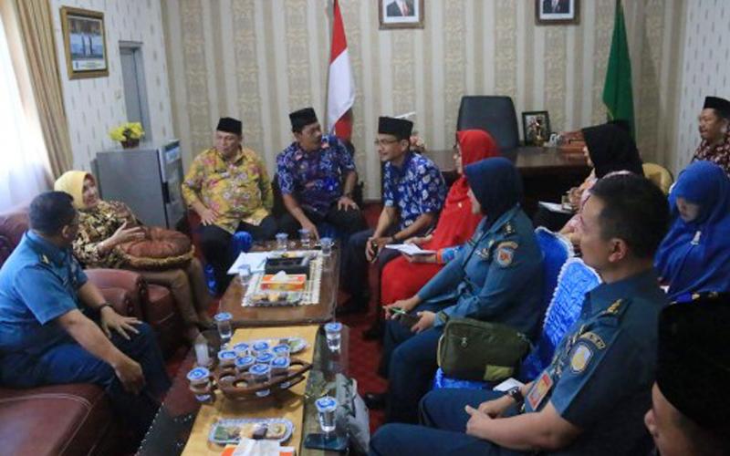 Rapat dalam rangka kegiatan latihan kesehatan yang fokus pada wilayah bencana dan pemberdayaan masyarakat
